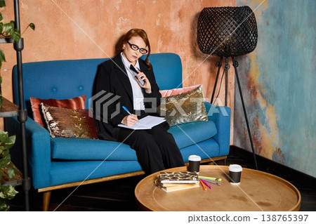 Casual interview scene with smiling woman and coffee cups 138765397