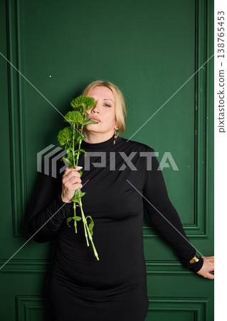 Trendy female confidently displays bloom with technology 138765453