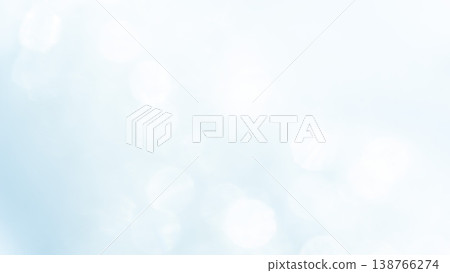 A light blue, fluffy bokeh gradient background. A light blue, fluffy bokeh gradient background. 138766274