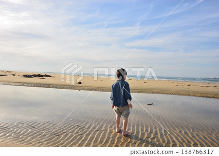 Children walking on the sand dunes of Itoshima Children walking on the sand dunes of Itoshima 138766317