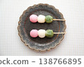 Three-colored dango arranged on a plate 138766895
