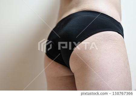 Man in black bikini 138767366