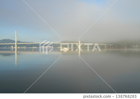 Bridge reflected on the water 138768283