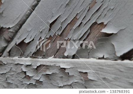 A wooden door with peeling paint A wooden door with peeling paint 138768391