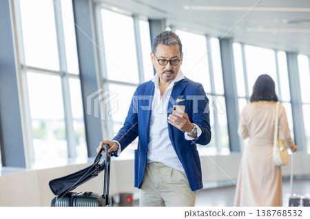 Senior man looking at smartphone Senior man looking at smartphone 138768532