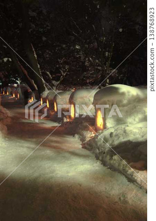 Snow igloo and candle 138768923