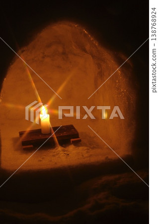 Snow igloo and candle Snow igloo and candle 138768924