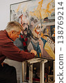 portrait of old painter painting. Revolution. Ukraine, 2014 138769214
