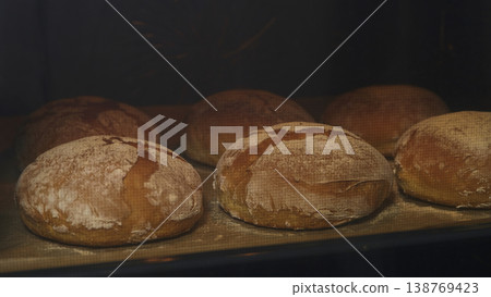 Warm Oven Transforms Dough Into Crusty Artisan Bread With Rich Flavor 138769423