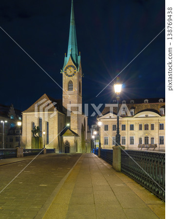 Nighttime Scene Of Zurich Bridge With Glowing Clock And Shadows 138769438