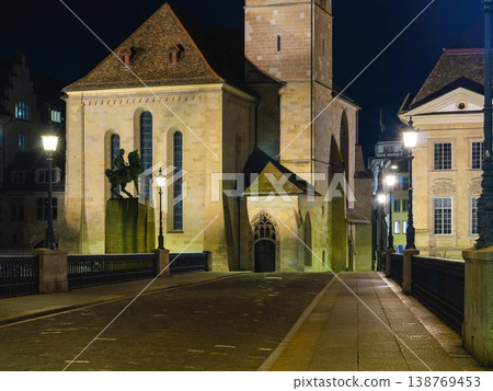 Peaceful Alleyway Featuring Aged Stonework Illuminated Softly By Lamps 138769453