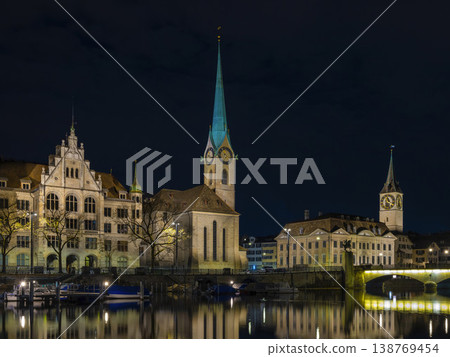 Quiet River Reflecting Sparkling City Lights And Historic Architecture 138769454