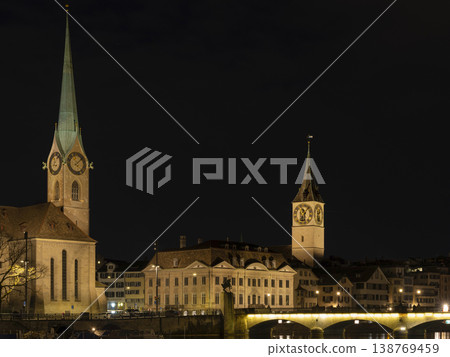 Vivid Night Scene Emphasizing Architectural Details And River Reflections 138769459