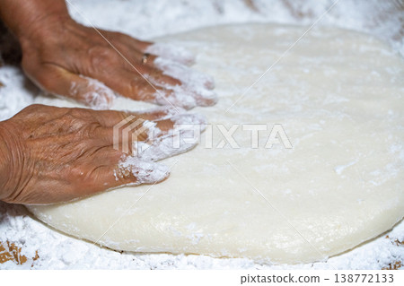 Hands kneading mochi Hands kneading mochi 138772133