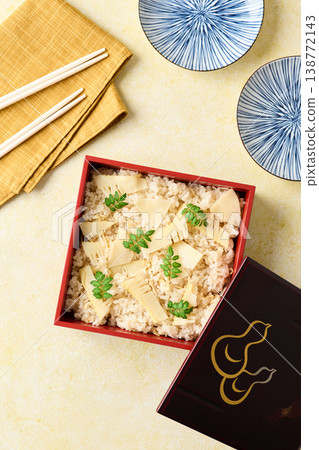 Bamboo shoot rice packed in a tiered bento box Bamboo shoot rice packed in a tiered bento box 138772143