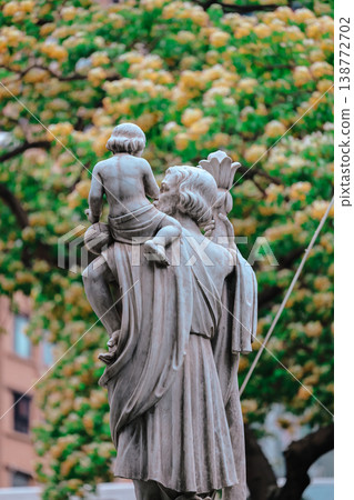 April 3 2026 Saint Teresa Church Statue And Blossoms 138772702
