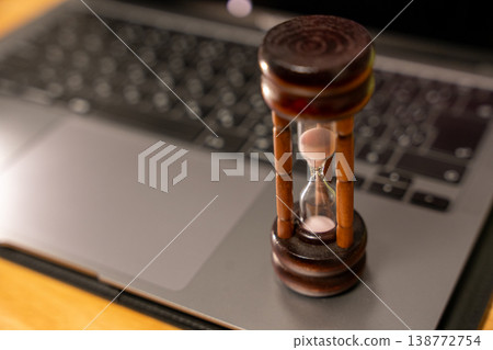 Laptop and hourglass 138772754
