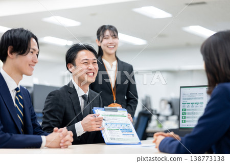 A businessman explaining the contract details A businessman explaining the contract details 138773138
