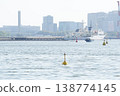 A scene of yellow buoys floating in the sea off Odaiba and large ships (Tokyo Bay, Waterfront Subcenter, Spring) 138774145