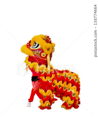 Top view of lion dance red and yellow color Dress are standing on white background, focus selective Top view of lion dance red and yellow color Dress are standing on white background, focus selective 138774664