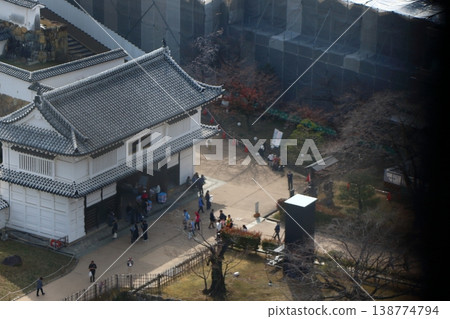 The view of Himeji City from the windows at the top of the tenshu or castle keep of Himeji Castle in Japan The view of Himeji City from the windows at the top of the tenshu or castle keep of Himeji Castle in Japan 138774794