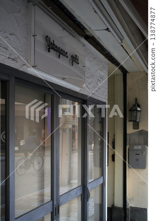 Shop glass sashes and bicycles Shop glass sashes and bicycles 138774877