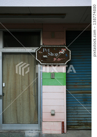 The store entrance and the blue shutter The store entrance and the blue shutter 138774880