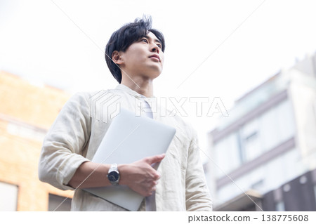 A man with a laptop A man with a laptop 138775608
