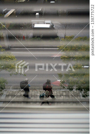 View of the road from the blinds View of the road from the blinds 138775722