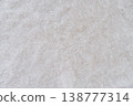Close-up of soft white mohair fabric with delicate fibers and fluffy texture. 138777314
