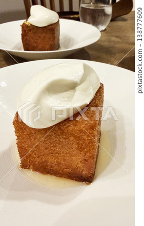 Savarin (French) or Baba (Italian): A dessert made with alcohol. Savarin (French) or Baba (Italian): A dessert made with alcohol. 138777609