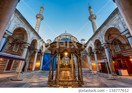 Laleli Mosque, or Laleli Camii courtyard with ornate fountain and minarets at twilight Istanbul Turkey Laleli Mosque, or Laleli Camii courtyard with ornate fountain and minarets at twilight Istanbul Turkey 138777652