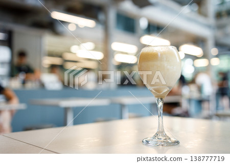 Cup of creation coffee drink in wine glass. Cup of creation coffee drink in wine glass. 138777719
