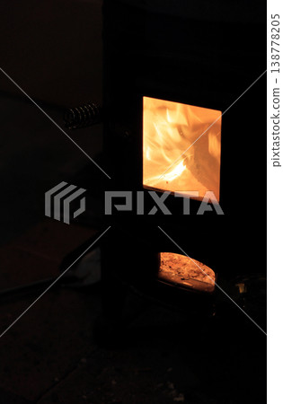 Flame of wood stove 138778205