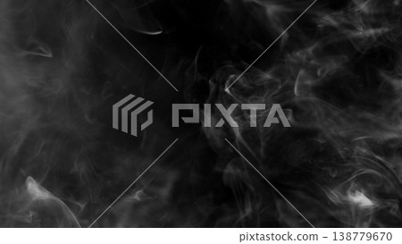 Detail Shot of Atmospheric Smoke Slowly Floating on Black Background 138779670