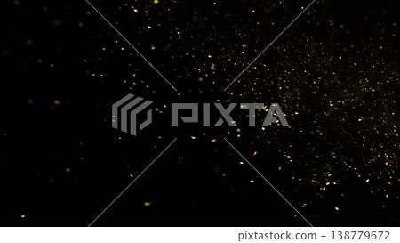 Freeze Motion Shot of Golden Glitter Background Isolated on Black 138779672