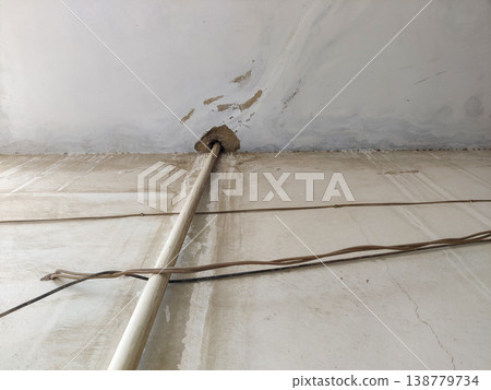 Pipe leakage on roof causing water seepage damage 138779734