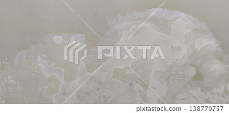 Wall surface with putty patches and off white base color showing repair before repaint 138779757