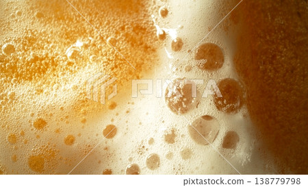 Macro Shot of Pouring Beer Drink , abstract background Macro Shot of Pouring Beer Drink , abstract background 138779798