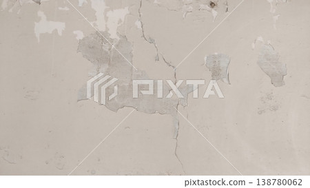 Peeling paint on cracked wall surface with signs of decay Peeling paint on cracked wall surface with signs of decay 138780062