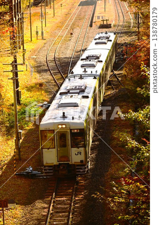 Autumn on the JR Kamaishi Line (Kiha 110 series) near Rikuchu-Ohashi Station Autumn on the JR Kamaishi Line (Kiha 110 series) near Rikuchu-Ohashi Station 138780179