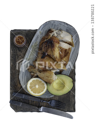 Succulent roasted chicken takes center stage, its skin rendered to a deep, burnished bronze. promising savory depth, while a halved avocado offers a cool, lime-green contrast. Succulent roasted chicken takes center stage, its skin rendered to a deep, burnished bronze. promising savory depth, while a halved avocado offers a cool, lime-green contrast. 138780221