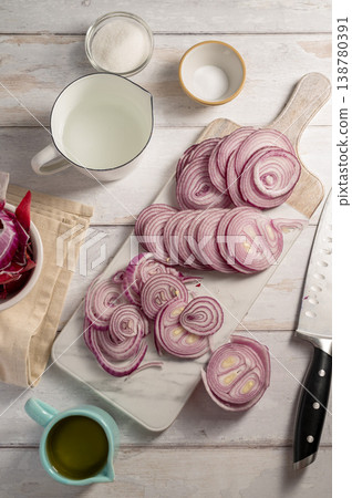 Cooking homemade pickled red onions ingredients, bright background Cooking homemade pickled red onions ingredients, bright background 138780391