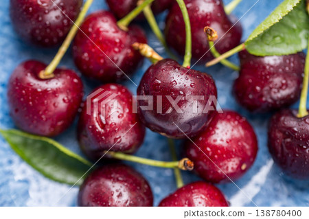 Fresh cherries fruits in a plate, macro photography, summer fruits. 138780400