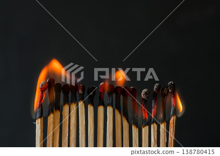 Burning matches. Abstract concept of burnout in couple, dark background 138780415