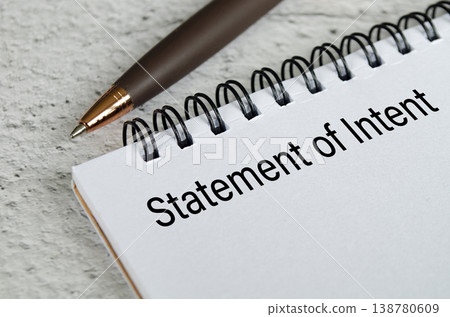 Statement of intent written on paper representing purpose, commitment, and formal organizational direction. Statement of intent written on paper representing purpose, commitment, and formal organizational direction. 138780609
