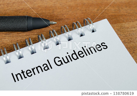 Internal Guidelines written on notepad representing business and work guidelines. Internal Guidelines written on notepad representing business and work guidelines. 138780619