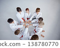Students in martial arts forming circles before their belt examination 138780770