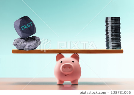Piggy bank balancing savings and debt financial risk concept Piggy bank balancing savings and debt financial risk concept 138781006