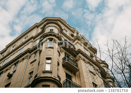 Corner residential building with balconies and decorative elements in Belgrade. Concept of urban living, housing market and European architecture style Corner residential building with balconies and decorative elements in Belgrade. Concept of urban living, housing market and European architecture style 138781758